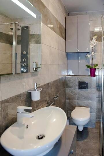 Фото номера Апартаменты с 2 спальнями Апартаменты Elegance Apartment г. Дзивнувек 45