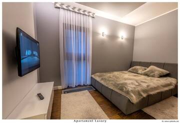 Фото номера Апартаменты с видом на сад Апартаменты Apartament 75,143 Porta Mare г. Дзивнувек 12