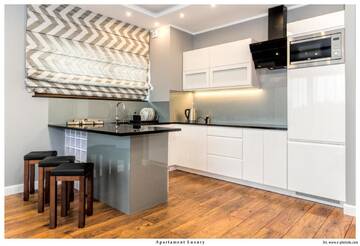 Фото номера Апартаменты с видом на сад Апартаменты Apartament 75,143 Porta Mare г. Дзивнувек 9