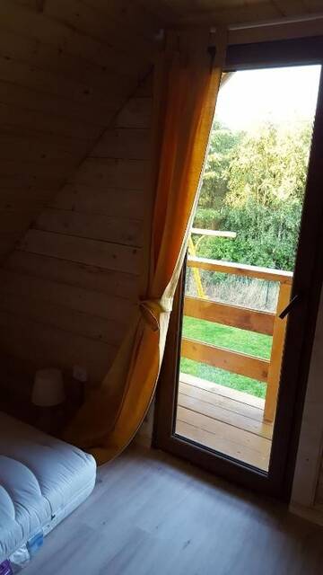 Фото номера Дом с 2 спальнями Дома для отпуска Sjesta -domki letniskowe г. Дзивнувек 36