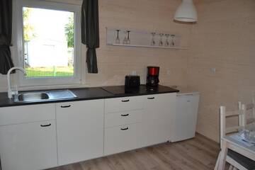 Фото номера Дом для отпуска Дома для отпуска Blockhaus Aurora г. Дзивнувек 58