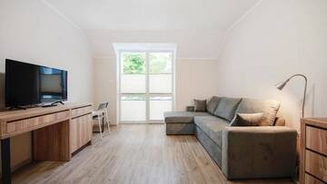 Фото номера Семейный номер с балконом Курортные отели Family-Holiday Spa&amp;Resort г. Дзивнувек 3