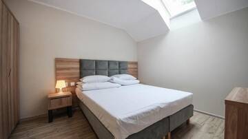 Фото номера Семейный номер с балконом Курортные отели Family-Holiday Spa&amp;Resort г. Дзивнувек 4