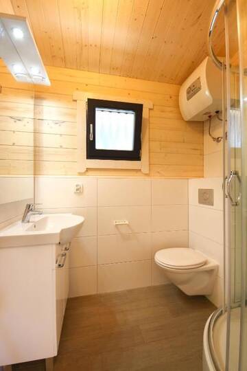 Фото номера Шале с двумя спальнями Курортные отели Family-Holiday Spa&amp;Resort г. Дзивнувек 15