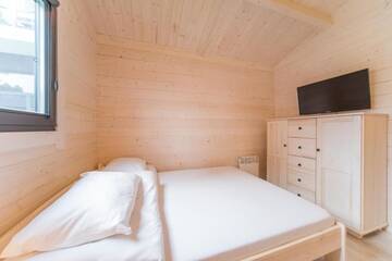 Фото номера Шале с двумя спальнями Курортные отели Family-Holiday Spa&amp;Resort г. Дзивнувек 12