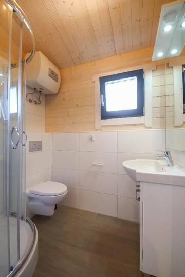 Фото номера Шале с одной спальней Курортные отели Family-Holiday Spa&amp;Resort г. Дзивнувек 4