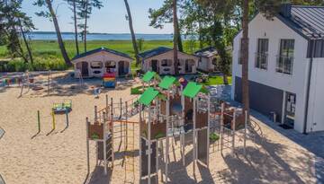 Фото номера Шале Курортные отели Family-Holiday Spa&amp;Resort г. Дзивнувек 7