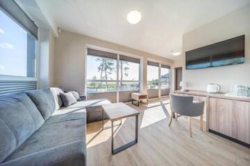 Фото номера Номер-студио с видом на озеро Курортные отели Family-Holiday Spa&amp;Resort г. Дзивнувек 2