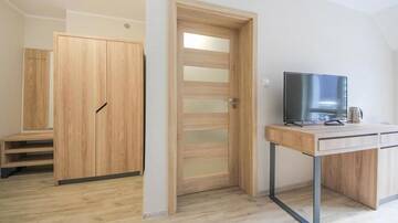 Фото номера Семейный номер с балконом Курортные отели Family-Holiday Spa&amp;Resort г. Дзивнувек 6