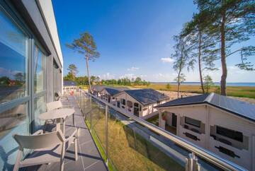 Фото номера Четырехместный номер с балконом Курортные отели Family-Holiday Spa&amp;Resort г. Дзивнувек 7