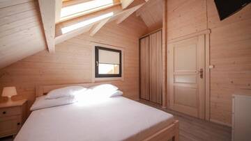 Фото номера Шале с двумя спальнями Курортные отели Family-Holiday Spa&amp;Resort г. Дзивнувек 9