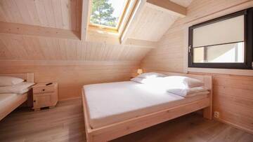 Фото номера Шале с двумя спальнями Курортные отели Family-Holiday Spa&amp;Resort г. Дзивнувек 6