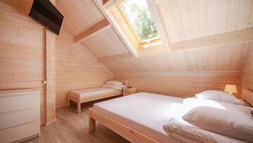 Фото номера Шале с двумя спальнями Курортные отели Family-Holiday Spa&amp;Resort г. Дзивнувек 7