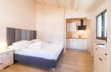 Фото номера Шале Курортные отели Family-Holiday Spa&amp;Resort г. Дзивнувек 9